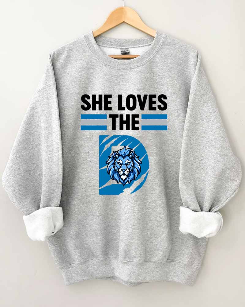 She loves the Detroit Football Crewneck Sweatshirt